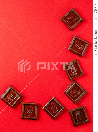 Chocolate bar pieces. Background with chocolate. Sweet food photo concept. 113317879
