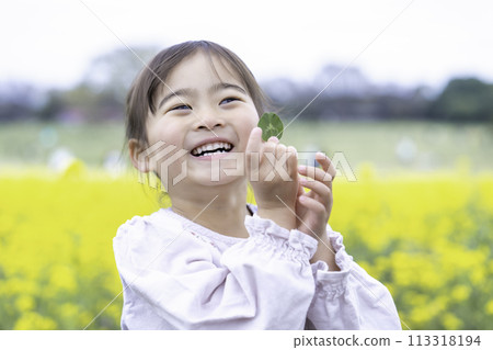 Girls playing in rape fields 113318194