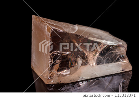 macro mineral stone Topaz on a black background macro mineral stone Topaz on a black background 113318371