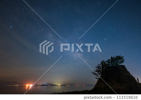 Beautiful Milky Way floating over Imoriiwa Rock in Okayama City, Okayama Prefecture, Japan 113319810