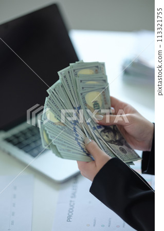 Close Up business woman Asian businesswoman financial bookkeeper girl in an office entrepreneur counting money cash count salary profit finance jackpot earn investment budget dollars banknotes Close Up business woman Asian businesswoman financial bookkeeper girl in an office entrepreneur counting money cash count salary profit finance jackpot earn investment budget dollars banknotes 113321755