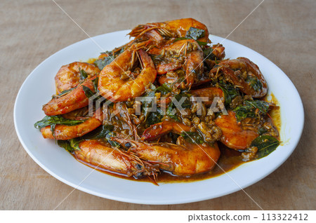 Advertisement for Kam Heong Prawns on white plate. 113322412