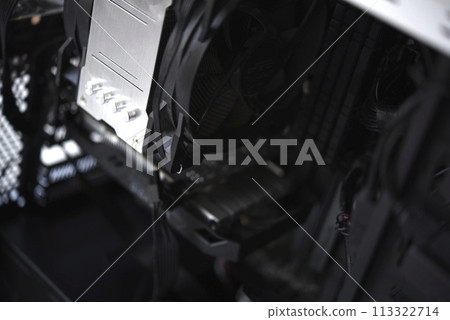 Inside the computer case. Processor radiator and RAM. 113322714