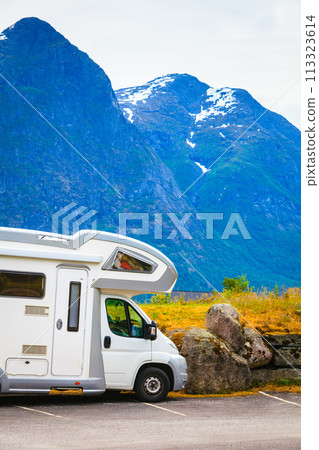 Camper car in norwegian mountains 113323614