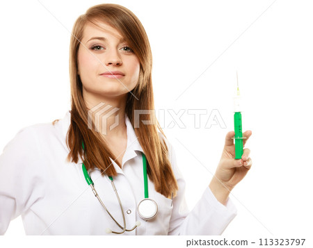 Medical. Woman doctor in lab coat with syringe 113323797