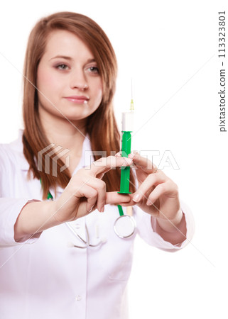Medical. Woman doctor in lab coat with syringe Medical. Woman doctor in lab coat with syringe 113323801