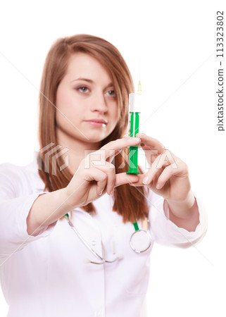 Medical. Woman doctor in lab coat with syringe Medical. Woman doctor in lab coat with syringe 113323802