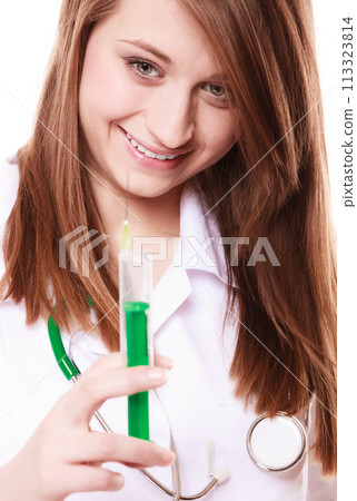 Medical. Woman doctor in lab coat with syringe 113323814