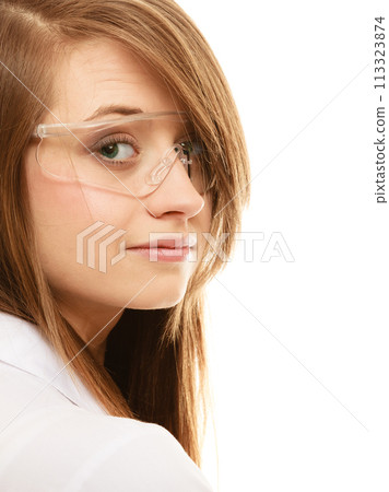 Laboratory. Chemist woman in goggles glasses isolated Laboratory. Chemist woman in goggles glasses isolated 113323874