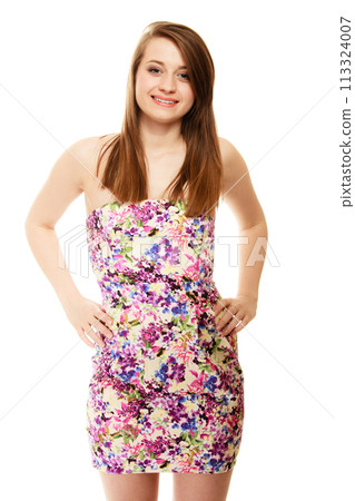 Summer fashion. Teenage girl in floral dress isolated 113324007