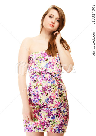 Summer fashion. Teenage girl in floral dress isolated 113324008