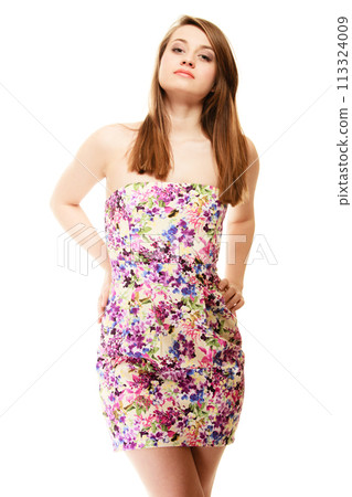 Summer fashion. Teenage girl in floral dress isolated 113324009