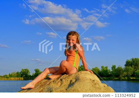Summer and happy childhood concept. Copy space in bright blue sky Summer and happy childhood concept. Copy space in bright blue sky 113324952