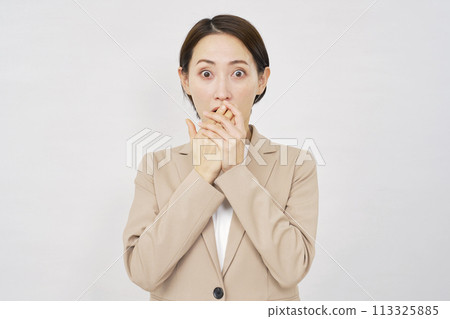 Surprised business woman white background Surprised business woman white background 113325885