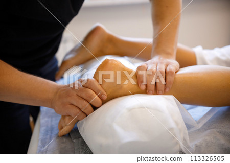 Revitalizing Foot Massage by Skilled Therapist Revitalizing Foot Massage by Skilled Therapist 113326505