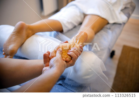 Unwinding with a Relaxing Leg Massage Unwinding with a Relaxing Leg Massage 113326515