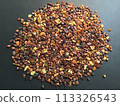 Many amber grains on a black background 113326543
