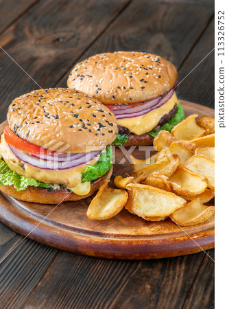 Hamburgers with potato dippers 113326752