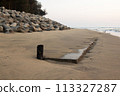 Concrete pier on the coast 113327287