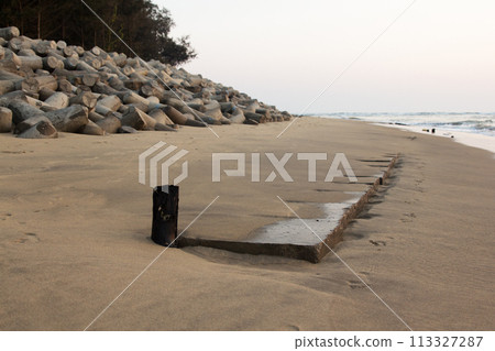 Concrete pier on the coast Concrete pier on the coast 113327287