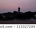 fishermen on the rock ocean 113327289
