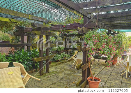 Closed cafe terrace in a small European city 113327605