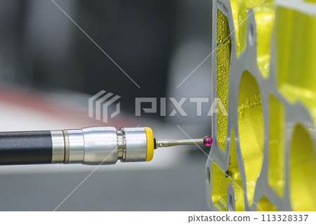 The multi axis CMM machine measuring the aluminum cylinder head parts. 113328337