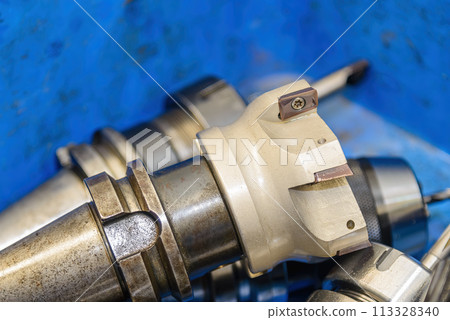 Close up scene the indexable fool for face milling and the arbor. Close up scene the indexable fool for face milling and the arbor. 113328340