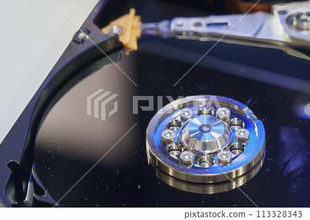 Close up scene the dust on the magnet disk of hard drive. Close up scene the dust on the magnet disk of hard drive. 113328343
