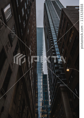 tall skyscrapers buildings looking up perspective, modern architecture of steel and glass, skyline of Toronto big city 113328888
