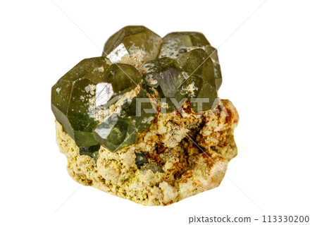 Macro stone Demantoid mineral on white background Macro stone Demantoid mineral on white background 113330200