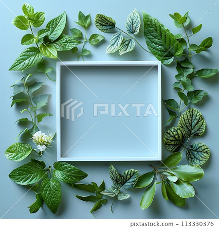 Creative layout made of green leaves and flowers. Flat lay. Nature concept. Creative layout made of green leaves and flowers. Flat lay. Nature concept. 113330376
