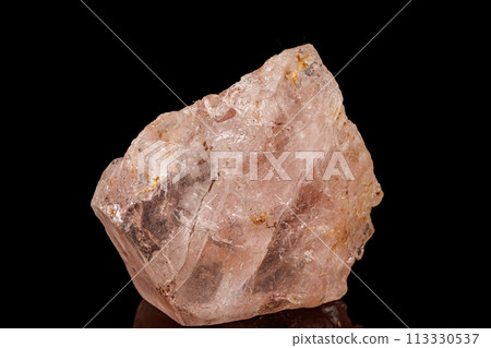 Macro tourmaline mineral stone on black 113330537