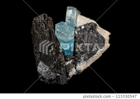 Macro stone mineral tourmaline aquamarine with a black background Macro stone mineral tourmaline aquamarine with a black background 113330547