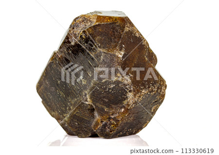 Macro of a mineral stone Vesuvianite on a white background Macro of a mineral stone Vesuvianite on a white background 113330619