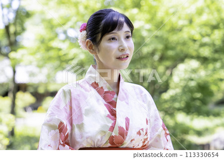 A woman in a yukata A woman in a yukata 113330654