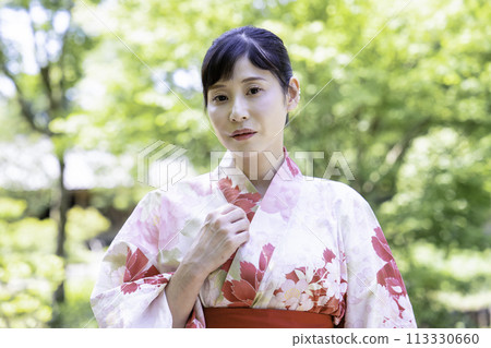 A woman in a yukata A woman in a yukata 113330660