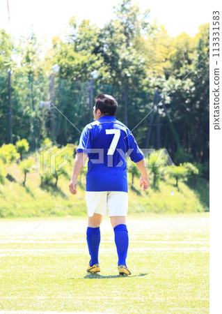 Adult male soccer match 113331583