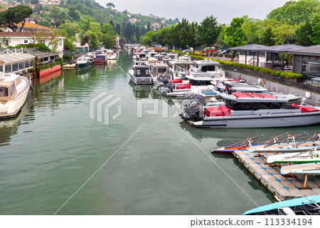 Group of boats docked in Goksu Stream, beside Anadolu Hisari historic castle on the Asian side of Istanbul, Turkey 113334194