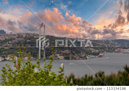 Sunrise shot of Istanbul city from Fethi Pasha Grove overlooking Bosphorus Bridge, or Bogazici Koprusu, Istanbul, Turkey Sunrise shot of Istanbul city from Fethi Pasha Grove overlooking Bosphorus Bridge, or Bogazici Koprusu, Istanbul, Turkey 113334196