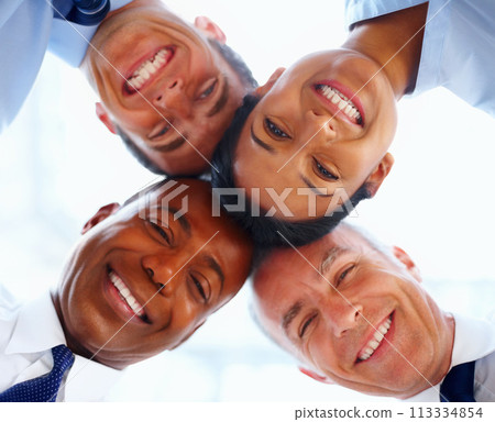 Portrait, businesspeople and huddle with low angle in office with closeup for diversity, trust and support with circle. Corporate, team and together with smile for unity, solidarity and inclusion 113334854
