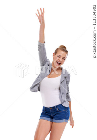 Excited winner, cheering or woman in studio isolated of news, announcement or bonus prize. Energy, smile or happy female person in celebration of fashion discount, success or sale on white background 113334902
