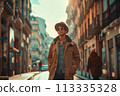 A man wearing a brown jacket and hat is walking down a city street 113335328