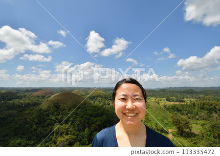 Chocolate Hills and a Japanese girl (Bohol, Philippines) 113335472