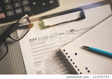 Tax income concept US tax form on table 113335714