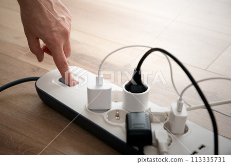 Power strip socket with connected plugs. 113335731