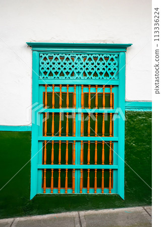 Beautiful facade of the houses at the historical downtown of the heritage town of Salamina located at the Caldas department in Colombia. Beautiful facade of the houses at the historical downtown of the heritage town of Salamina located at the Caldas department in Colombia. 113336224