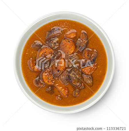 Beef stew with potatoes, carrots and herbs isolated on white background, top view Beef stew with potatoes, carrots and herbs isolated on white background, top view 113336721