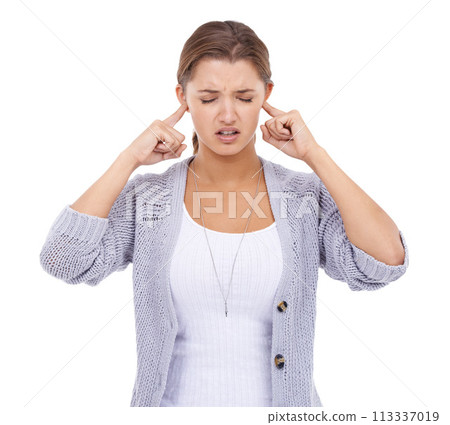 Noise, stop or woman with fingers in ears in studio for volume control, sensitive or block on white background. Annoyed, frustrated or model with not listening sign, complaint or stressed by tinnitus 113337019