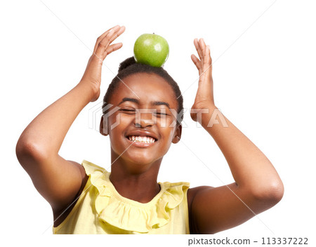 Balance, health and laugh with girl and apple in studio for nutrition, wellness and diet. Food, self care and vitamin c with face of African student and fruit on white background for fiber and smile 113337222